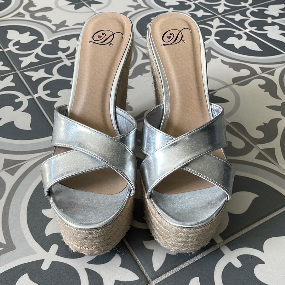Woman’s Silver Platform Wedge